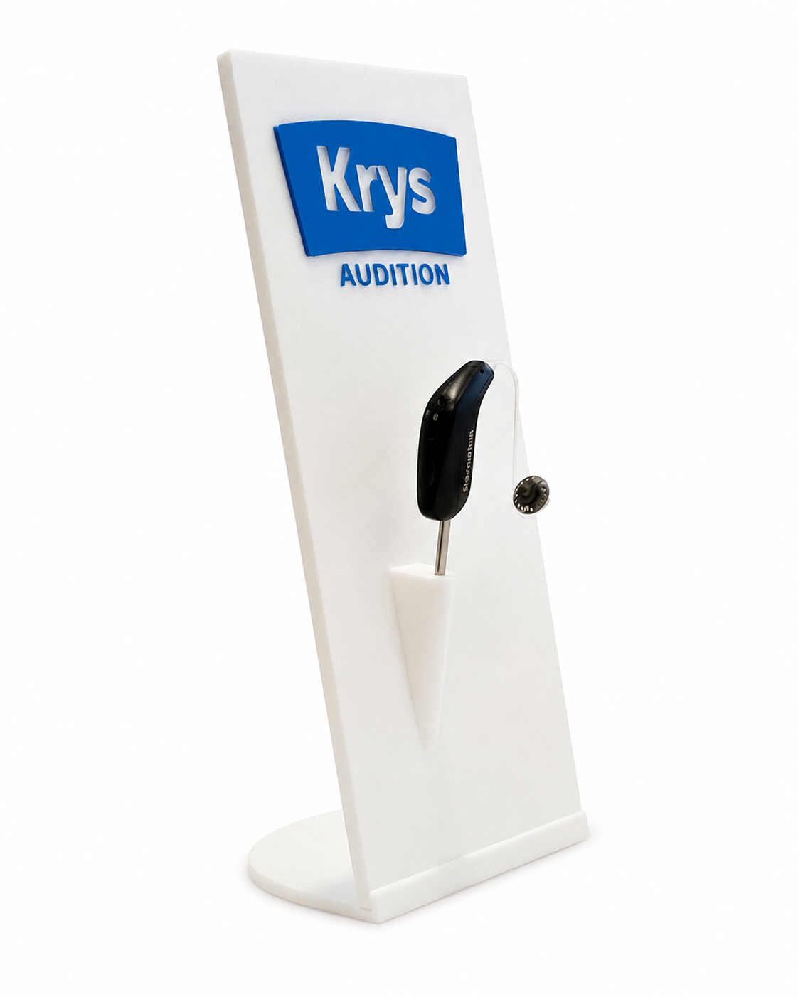 Support PLV blanc avec logo Krys Audition présentant une aide auditive factice